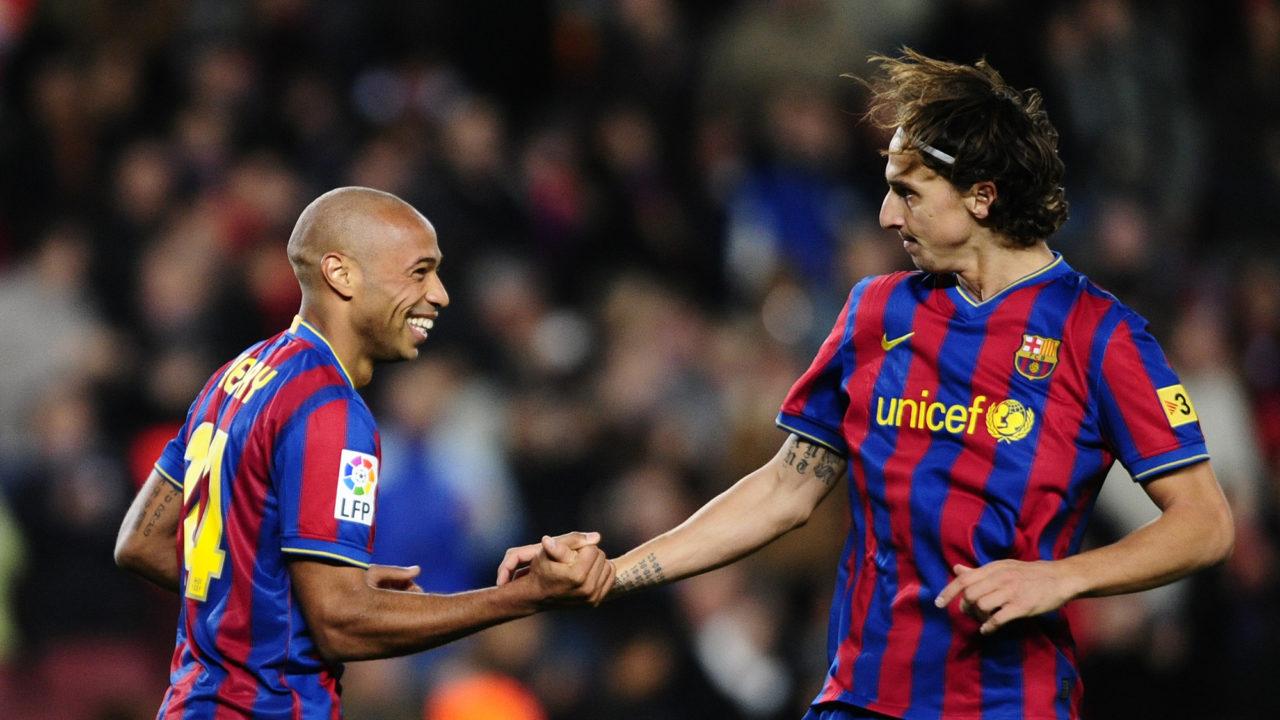 FC Barcelona's Thierry Henry of France, left, reacts after scoring with his teammate Zlatan Ibrahimovic of Sweden against Mallorca during a Spanish La Liga soccer match at the Camp Nou stadium in Barcelona, Spain, Saturday, Nov. 7, 2009. (AP Photo/Manu Fernandez)