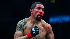 UFC 308: Whittaker mostra mandíbula deslocada após golpe de Chimaev