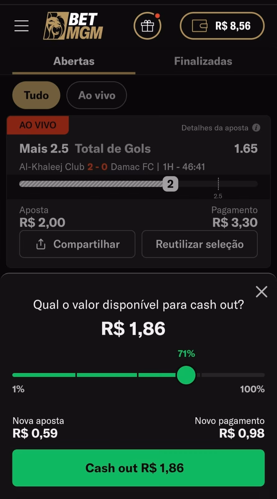 Cash out parcial na BetMGM com uma barra de rolagem definindo a retirada de R$1,86, ficando R$0,98 em jogo.