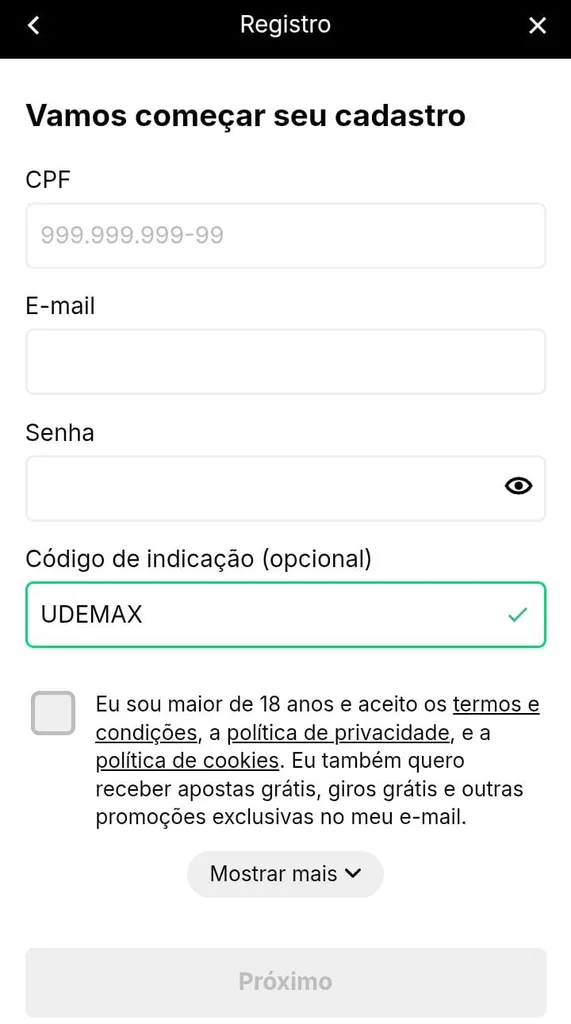 Formulário de registro da KTO, com campos de CPF, e-mail, senha e código de indicação preenchido com UDEMAX