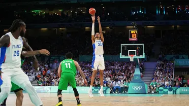 Castigado por gigante, Brasil perde para a França na estreia no basquete