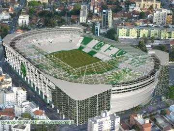 Vista aérea do estádio, totalmente coberto.